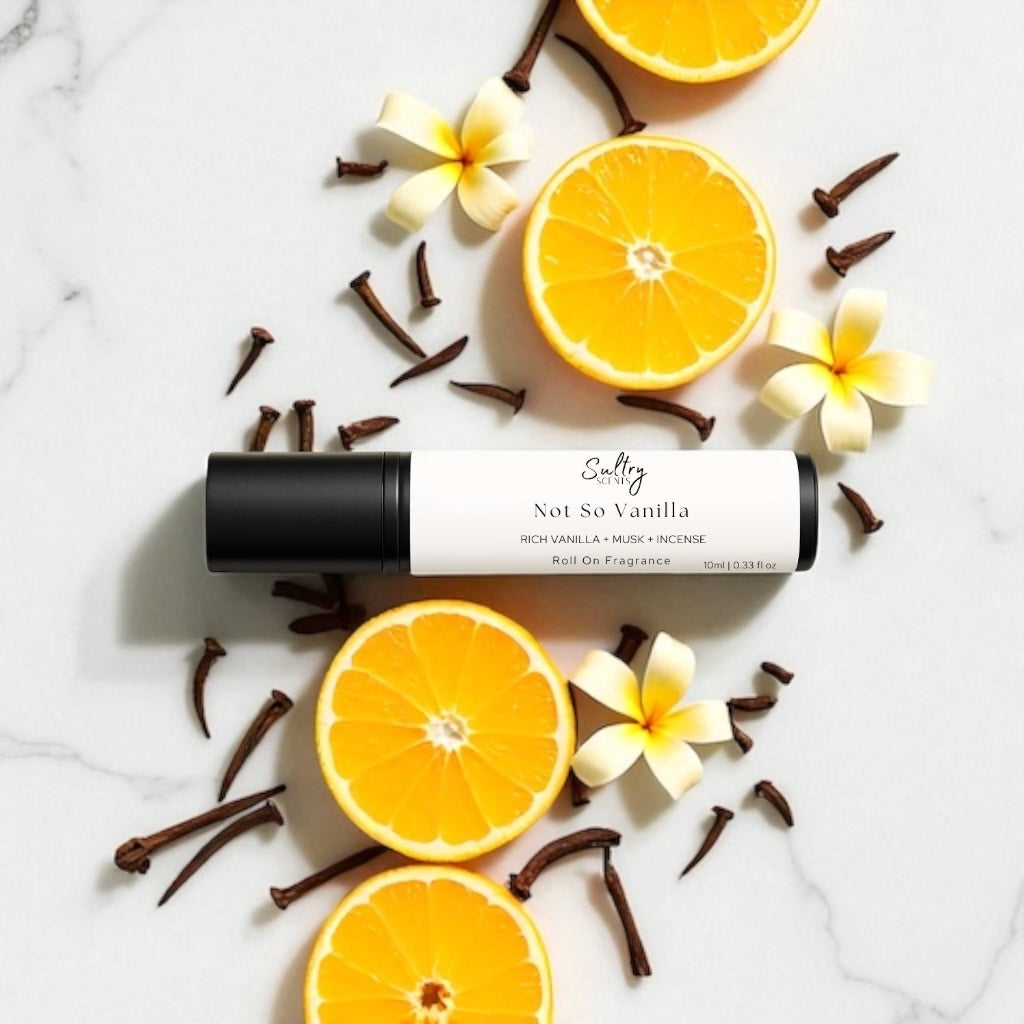 Sultry Scents Vanille 44 dupe roll on perfume with citrus and floral accents on marble background