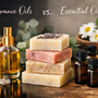 Comparison of Fragrance Oils vs Essential Oils with various bottles and handmade soaps