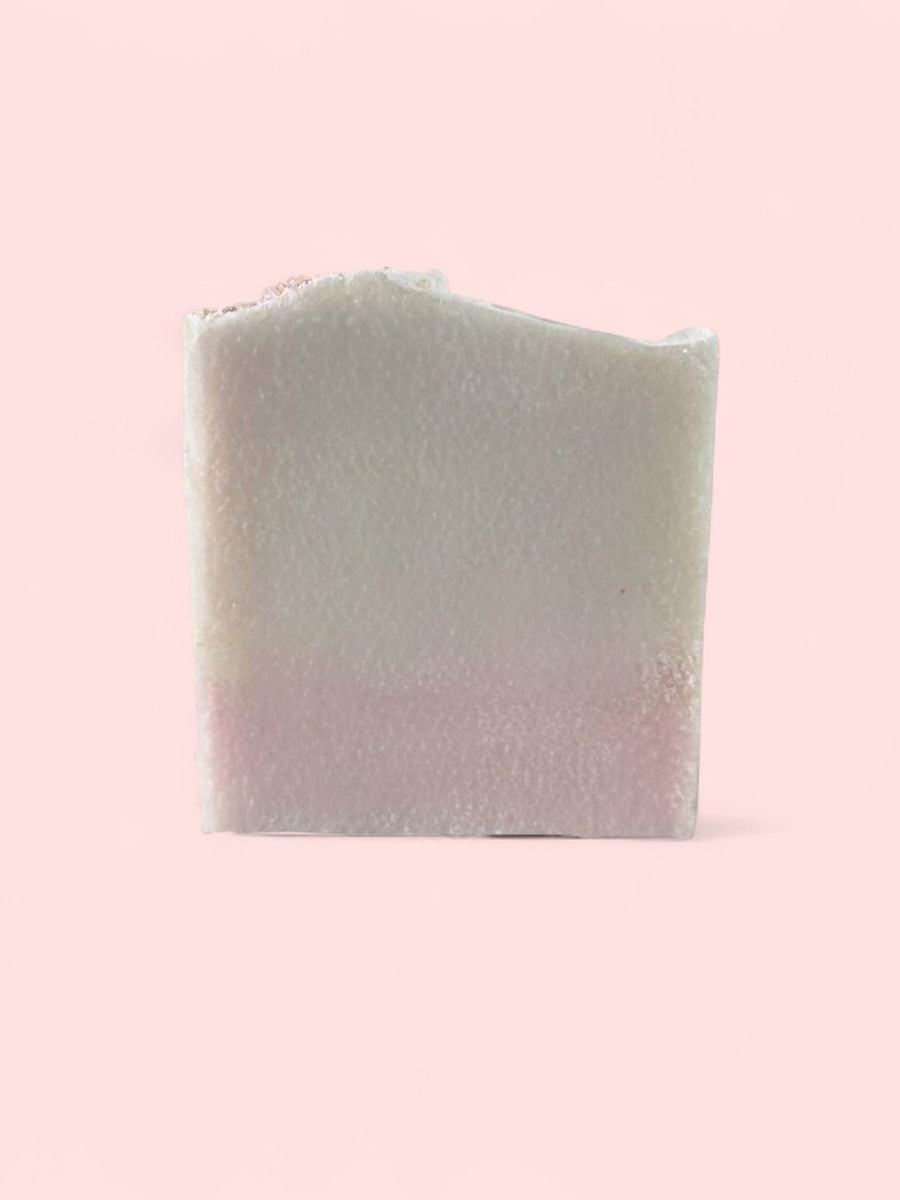 Sultry Scents luxury salt bar soap pale pink handmade block with wavy top on light pink background