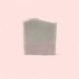 Sultry Scents luxury salt bar soap pale pink handmade block with wavy top on light pink background