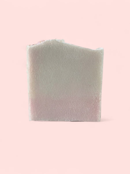 Sultry Scents luxury salt bar soap pale pink handmade block with wavy top on light pink background