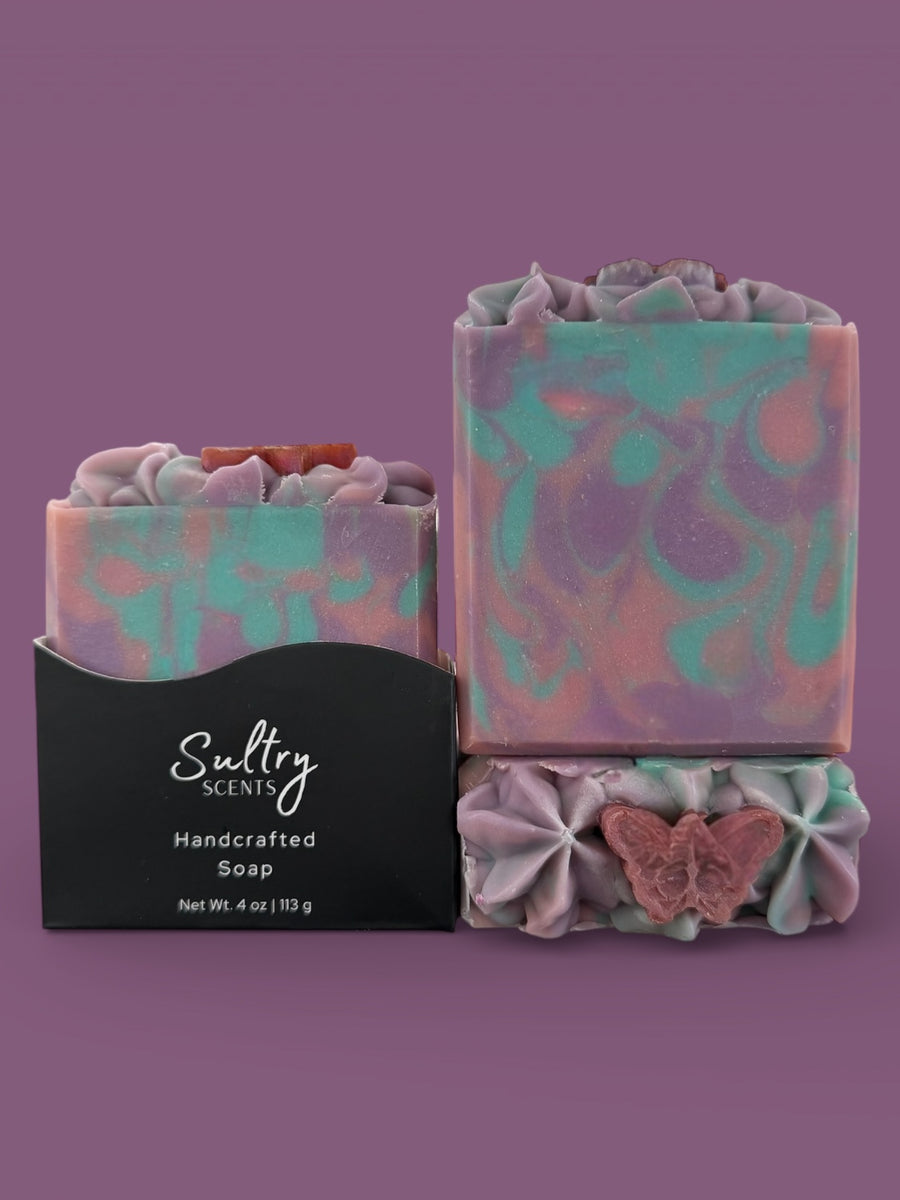 Sultry Scents Butterfly Pea Flower Soap in elegant purple and teal swirls with decorative accents