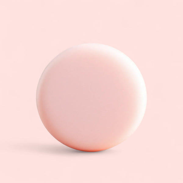 Sultry Scents pale pink round Sulfate free clarifying Solid Shampoo Bar on soft pink background