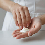 Applying Sultry Scents Diva inspired lightweight scented lotion on hands for smooth skin