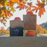 Fall Pumpkin Handcrafted Soap by Sultry Scents in a natural setting with autumn leaves