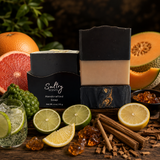 Fresh scented luxury handmade soap with citrus and fruit elements on a wooden display