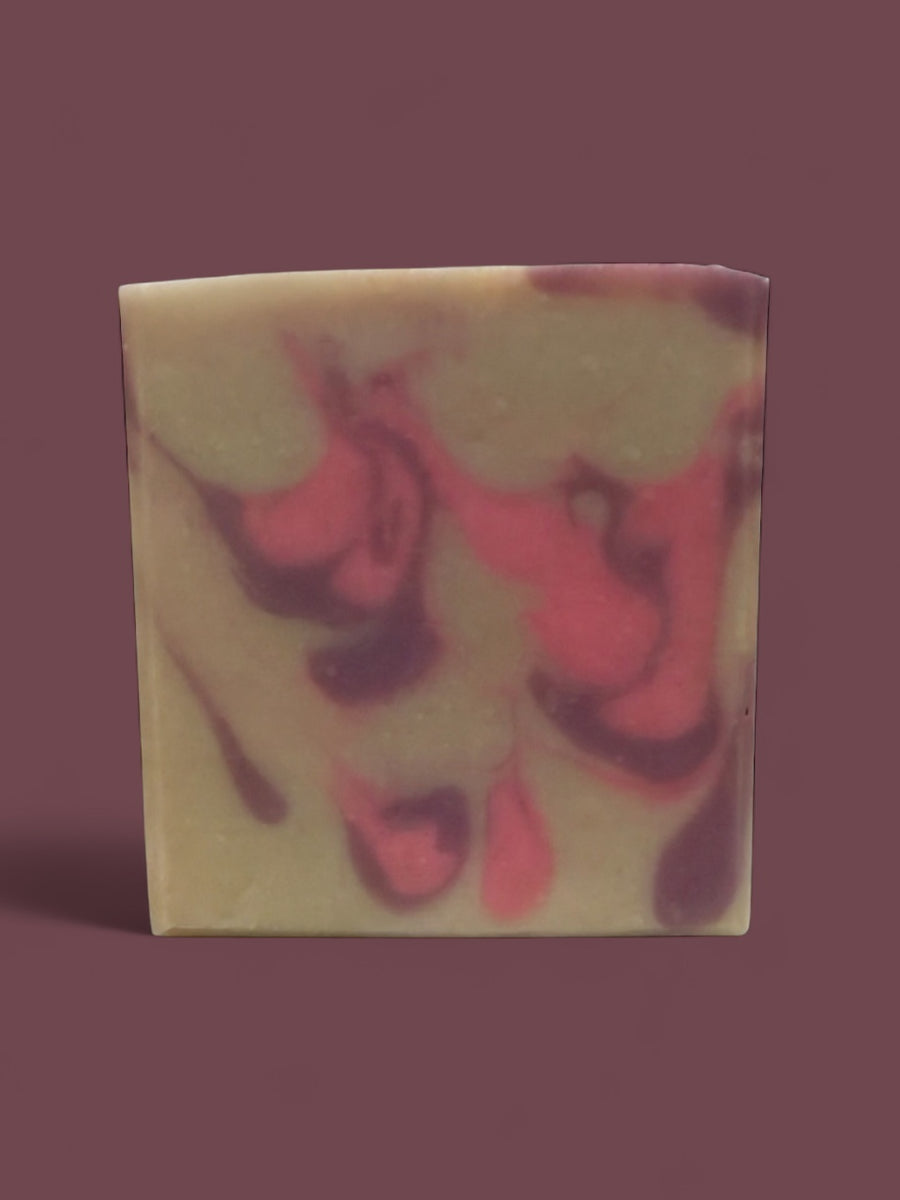 Goat Milk Soap inspired by CK Euphoria with a vibrant swirl design in green and pink