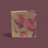 Goat Milk Soap inspired by CK Euphoria with a vibrant swirl design in green and pink