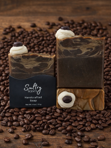 Sultry Scents handcrafted KC Roasterie coffee soap with coffee bean accents on a wood background
