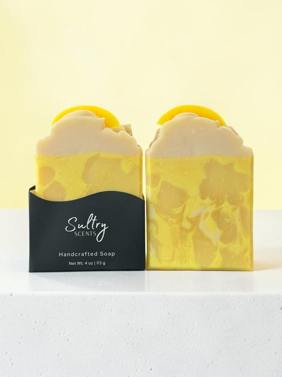 Lemon scented soap bar inspired by Under the Lemon Tree with vibrant yellow swirls and fresh lemon design