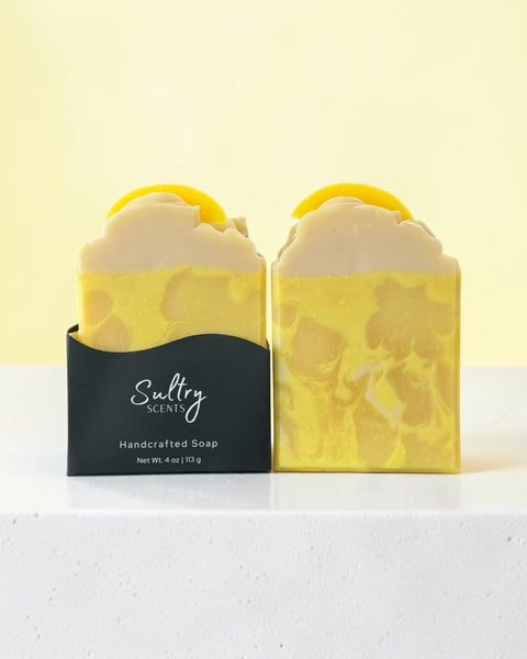 Lemon scented soap bar inspired by Under the Lemon Tree with vibrant yellow swirls and fresh lemon design