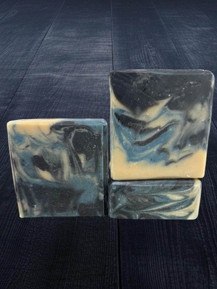 Mens soap inspired by YSL Myslf with black blue and cream swirl design by Sultry Scents