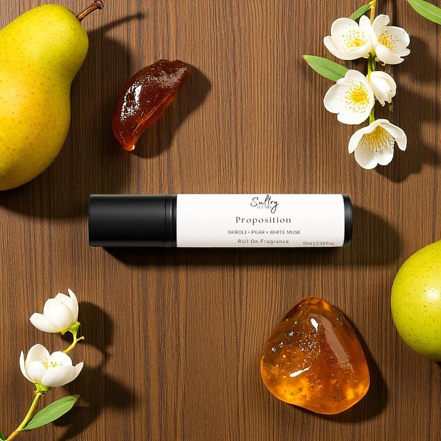 Sultry Scents roll on bottle with pears white blossoms and amber accents Perfume inspired by Prada Paradoxe