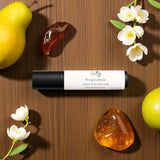 Sultry Scents roll on bottle with pears white blossoms and amber accents Perfume inspired by Prada Paradoxe