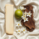 Phlur Missing Person inspired foaming hand soap bar with bergamot, jasmine flowers, and wood on satin fabric