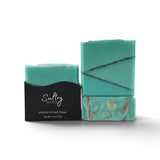 Santal 26 inspired Turquoise Soap Bar with decorative swirls in vibrant turquoise and gold accents