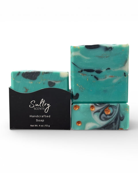 Santal 26 inspired Turquoise Soap Bar with a marbled teal design and gold accents for luxurious bathing