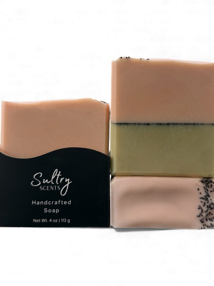 Three bars of handcrafted Sultry Scents all natural goat milk soap with unique colors and textures