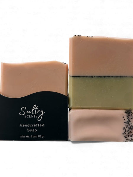 Three bars of handcrafted Sultry Scents all natural goat milk soap with unique colors and textures