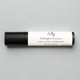 Sultry Scents Midnight Essence Roll-On Fragrance Oil with notes of vanilla, coffee, and cashmere wood, a Black Opium dupe roll-on perfume