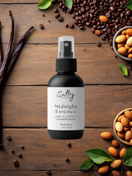 Sultry Scents Midnight Essence black bottle surrounded by vanilla beans coffee and almonds Black Opium inspired body spray