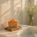 Blue Capri Volcano inspired soap Serendipity on a wooden soap dish by Sultry Scents.