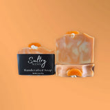 Blue Volcano inspired soap Serendipity handcrafted by Sultry Scents with orange slice decoration