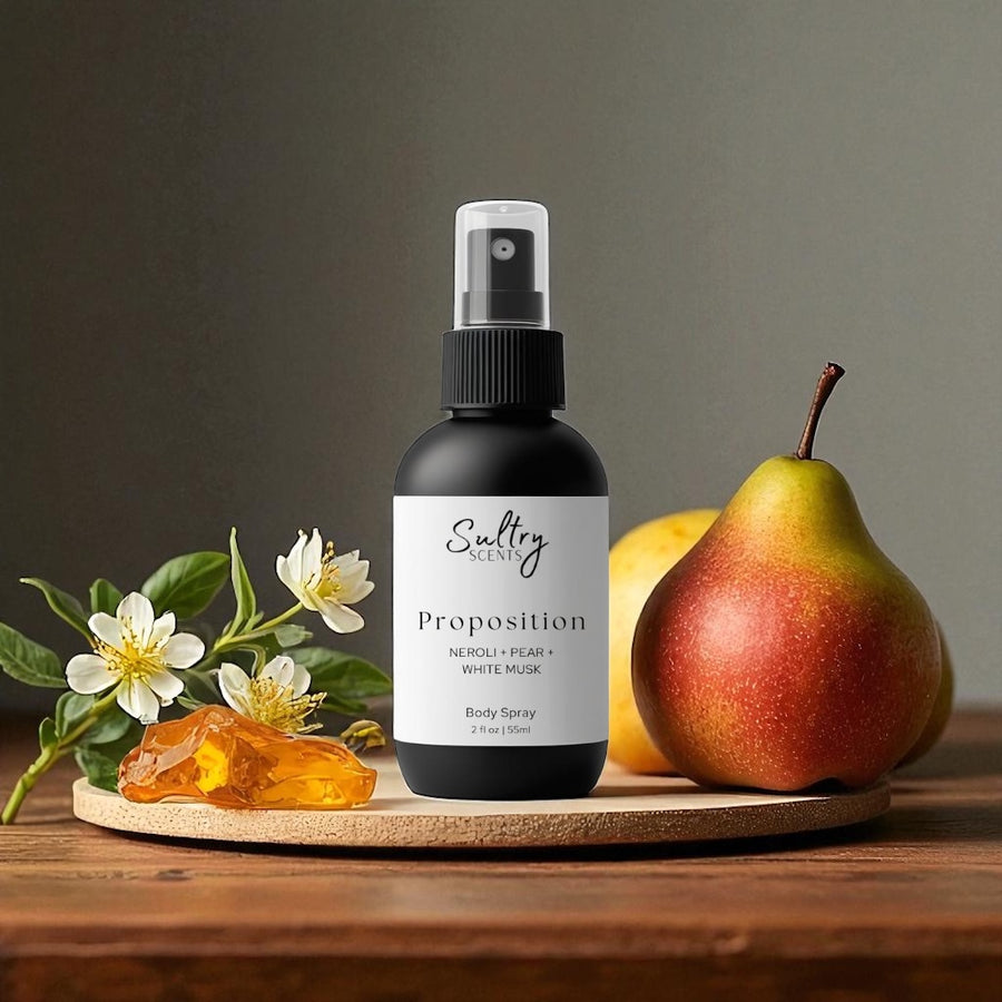Sultry Scents Proposition bottle with pear and neroli flowers on wooden board Body Spray inspired by Prada Paradoxe