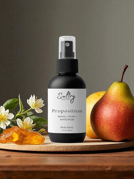Sultry Scents Proposition bottle with pear and neroli flowers on wooden board Body Spray inspired by Prada Paradoxe