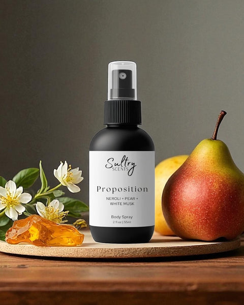 Sultry Scents Proposition bottle with pear and neroli flowers on wooden board Body Spray inspired by Prada Paradoxe