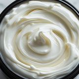 Close-up of smooth creamy texture in a jar of Boujee Butter Body Cream Inspired by Diva Scent Seduction by Sultry Scents