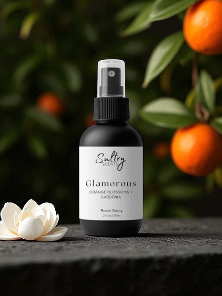 Sultry Scents Glamorous room spray bottle with gardenia blossom and oranges on branch Boutique Hotel Inspired Room Spray
