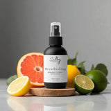 Breathtaking odor eliminating room spray Sultry Scents black bottle with grapefruit lemon lime and sandalwood