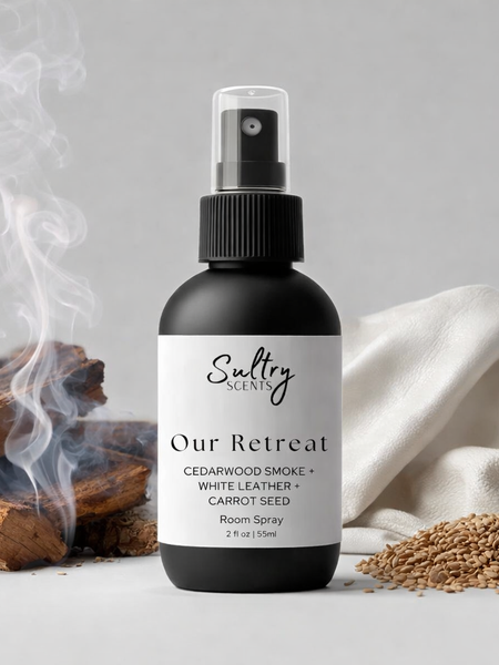 Cedarwood leather room spray from Sultry Scents with natural wood backdrop and smoke effect