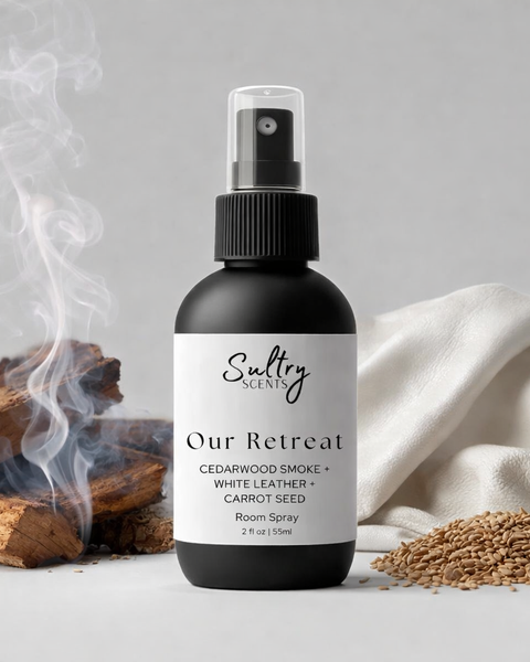 Cedarwood leather room spray from Sultry Scents with natural wood backdrop and smoke effect