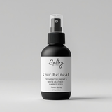 Sultry Scents Cedarwood Leather Room Spray in a sleek black bottle for a calming atmosphere