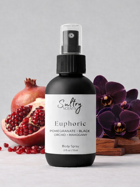 Sultry Scents CK Euphoria inspired body spray in a black bottle with pomegranate and orchid flowers