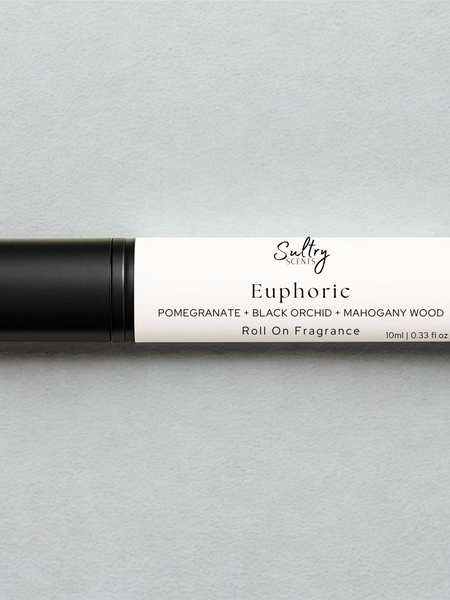 Euphoric roll on perfume inspired by CK Euphoria featuring pomegranate, black orchid, and mahogany wood