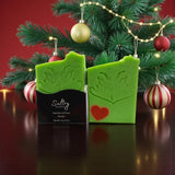 Holiday Grump soap bar from Sultry Scents, featuring festive green with a Grinch face and red heart for holiday cheer