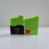 Sultry Scents Holiday Grump soap bar in green with Grinch face and heart detail