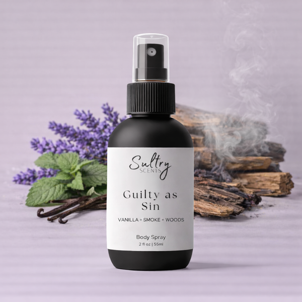 Iced Vanilla Woods Body Spray by Sultry Scents in a sleek black bottle with floral background