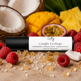 In Love with Everything Inspired Perfume with fruity notes of raspberries and tropical fruits around the roll-on perfume bottle.