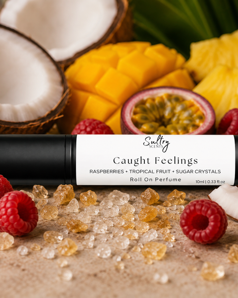 In Love with Everything Inspired Perfume with fruity notes of raspberries and tropical fruits around the roll-on perfume bottle.