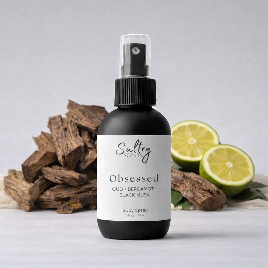 Sultry Scents Jo Malone Oud Bergamot dupe body spray in 2 oz bottle with citrus and wood background