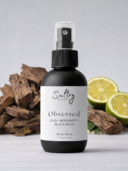 Sultry Scents Jo Malone Oud Bergamot dupe body spray in 2 oz bottle with citrus and wood background