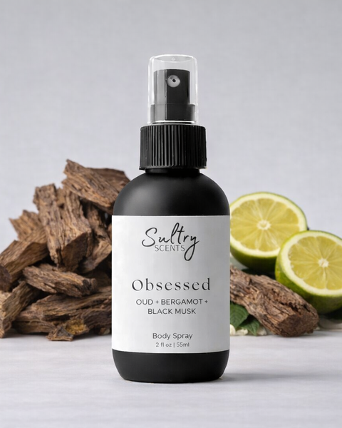 Sultry Scents Jo Malone Oud Bergamot dupe body spray in 2 oz bottle with citrus and wood background