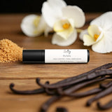Sultry Scents roll on bottle with vanilla beans and orchids Kayali Vanilla 28 inspired roll on perfume oil