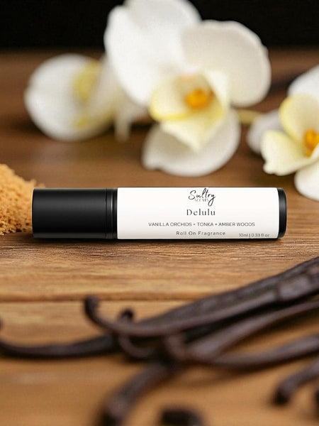 Sultry Scents roll on bottle with vanilla beans and orchids Kayali Vanilla 28 inspired roll on perfume oil