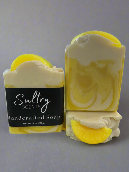 Sultry Scents lemon scented soap bar with vibrant yellow color and refreshing lemon design