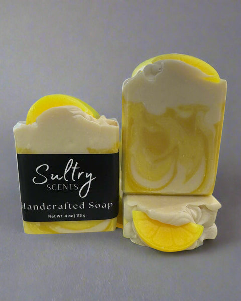 Sultry Scents lemon scented soap bar with vibrant yellow color and refreshing lemon design